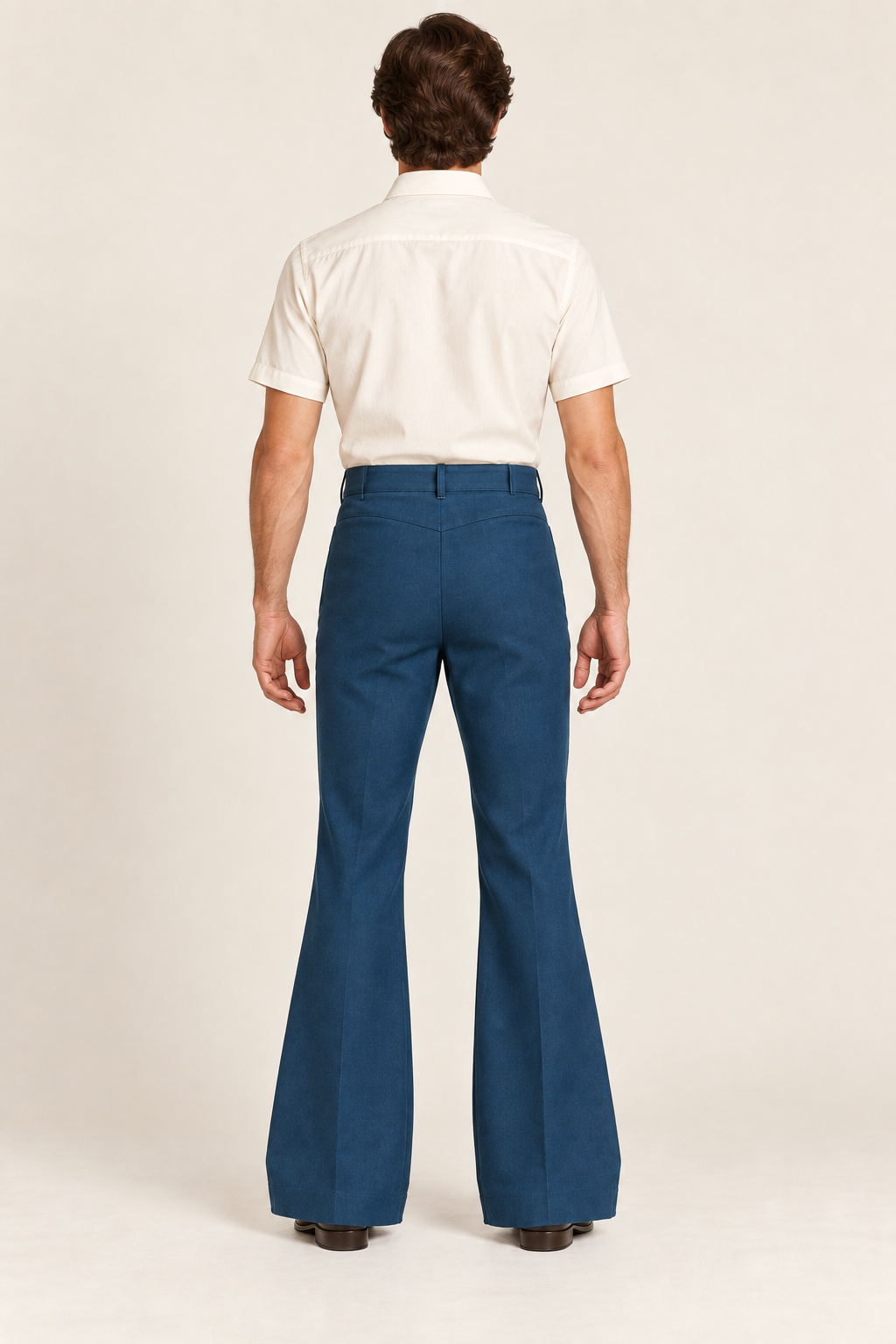 AI design preview: rear of petrol blue mens flared trousers with a shallow hip yoke and plain rear legs