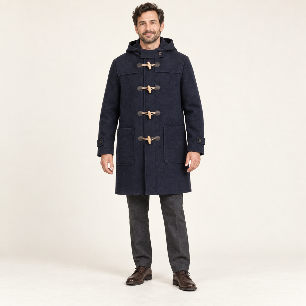 AI design preview: navy men’s hooded duffle coat with four toggles, shoulder overlays, patch pockets and wrist tabs