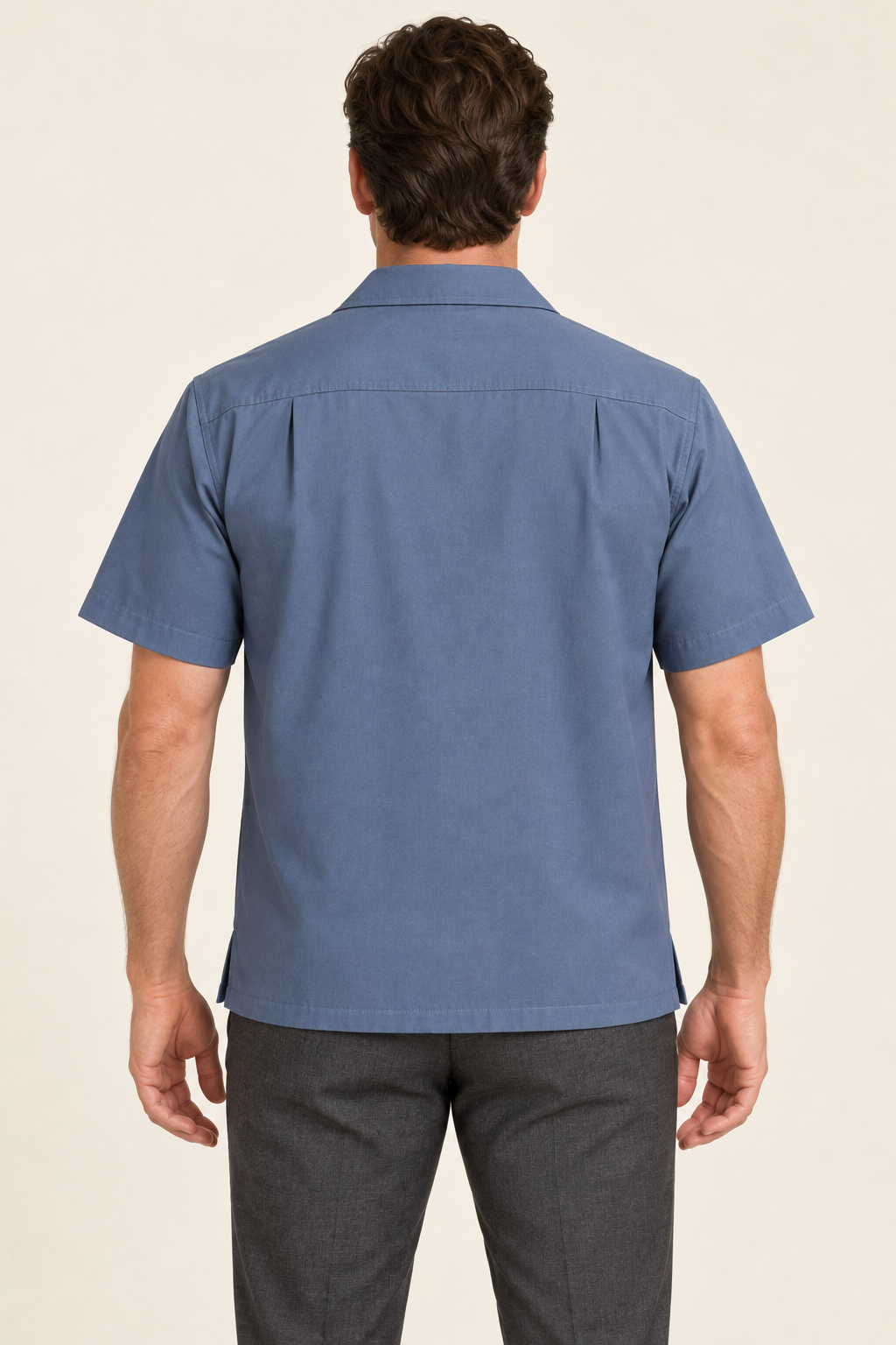 AI design preview: rear of the slate blue woven pullover shirt showing a shoulder yoke and two small fullness pleats