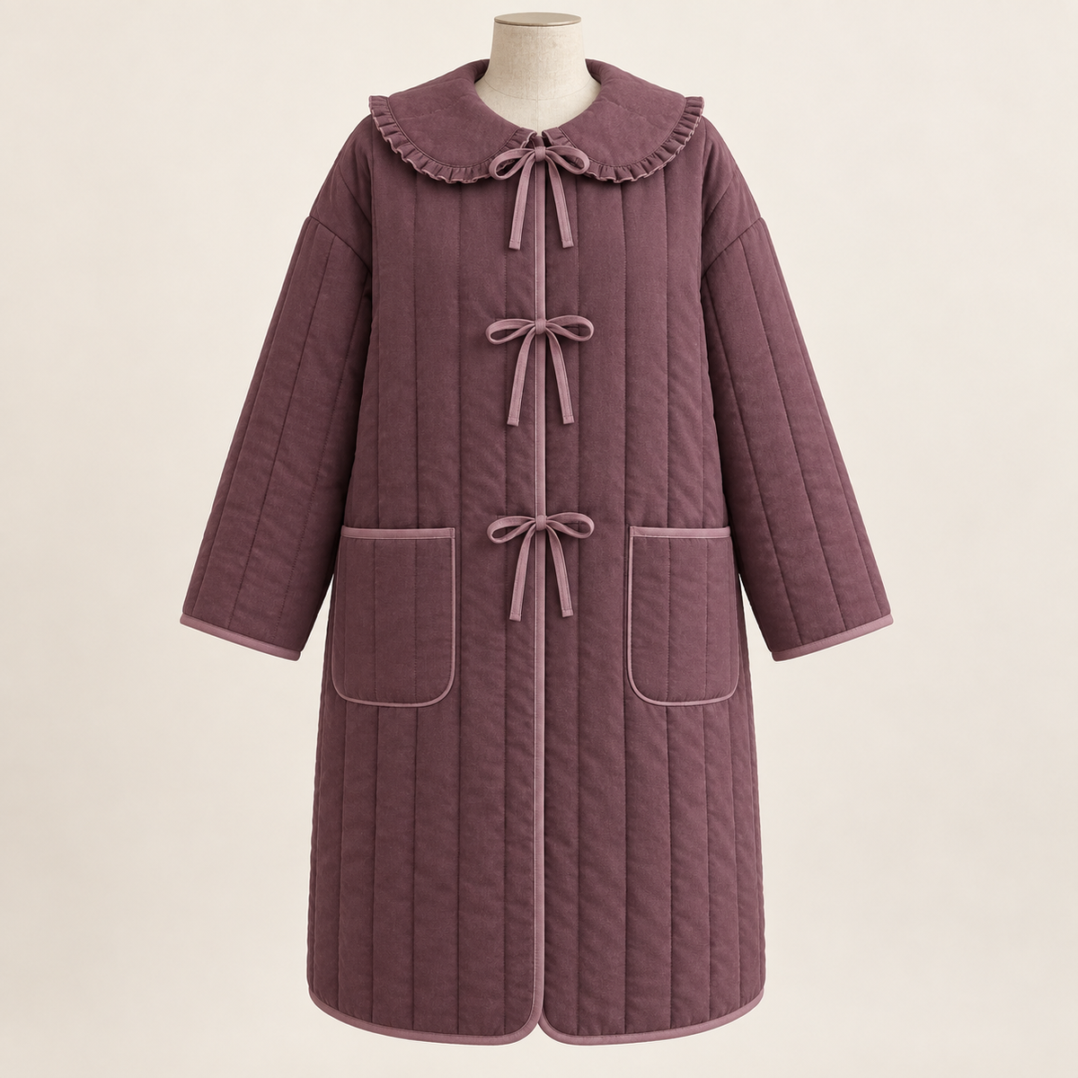 AI design preview: mulberry tie-front quilted coat with three bow closures, a round ruffle-edged collar, dropped sleeves and two patch pockets