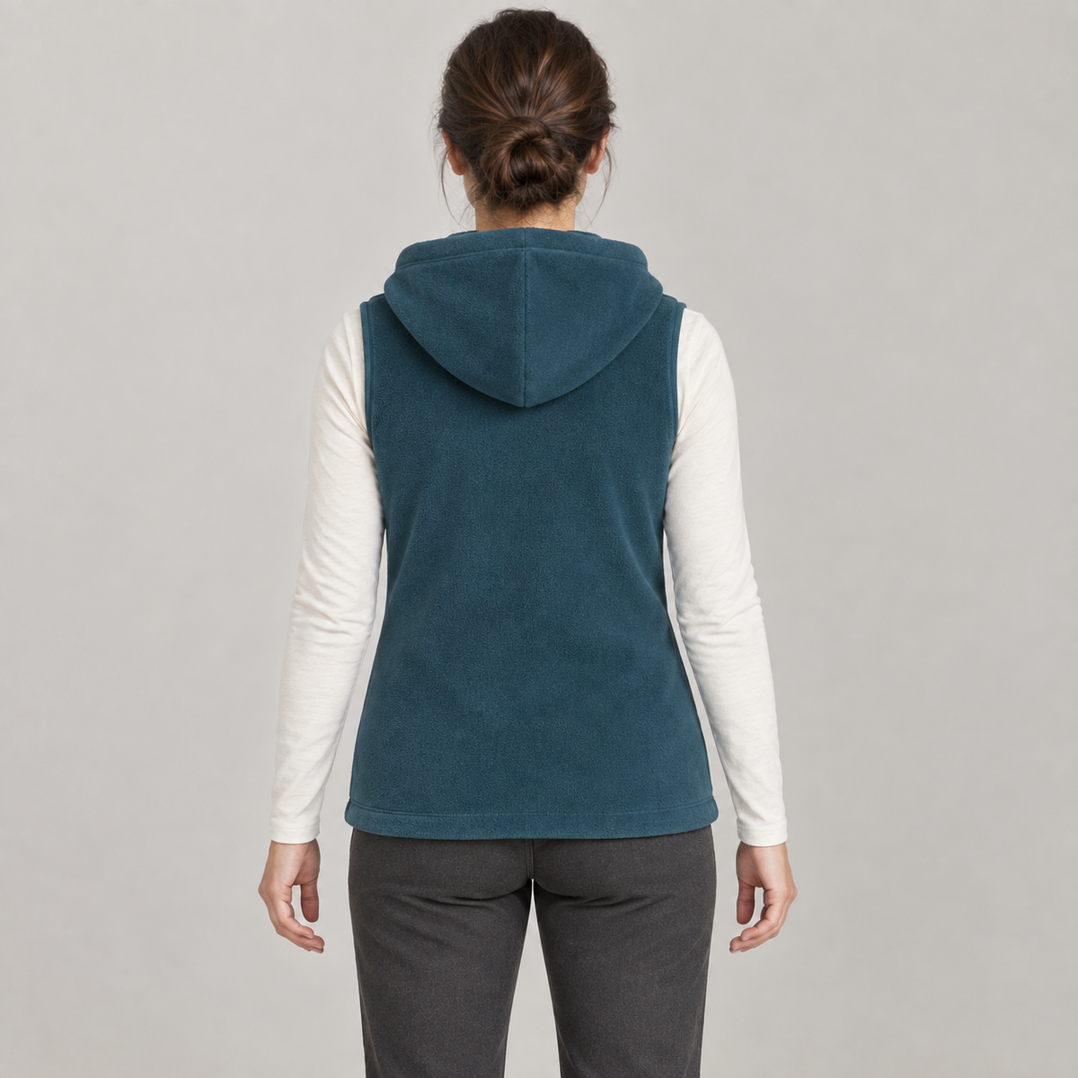 AI design preview: rear of the same petrol-teal fleece vest with a separate hood resting over a plain back