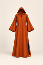 AI front preview of the same bell-sleeve caftan in burnt orange with navy edging and its attached hood raised