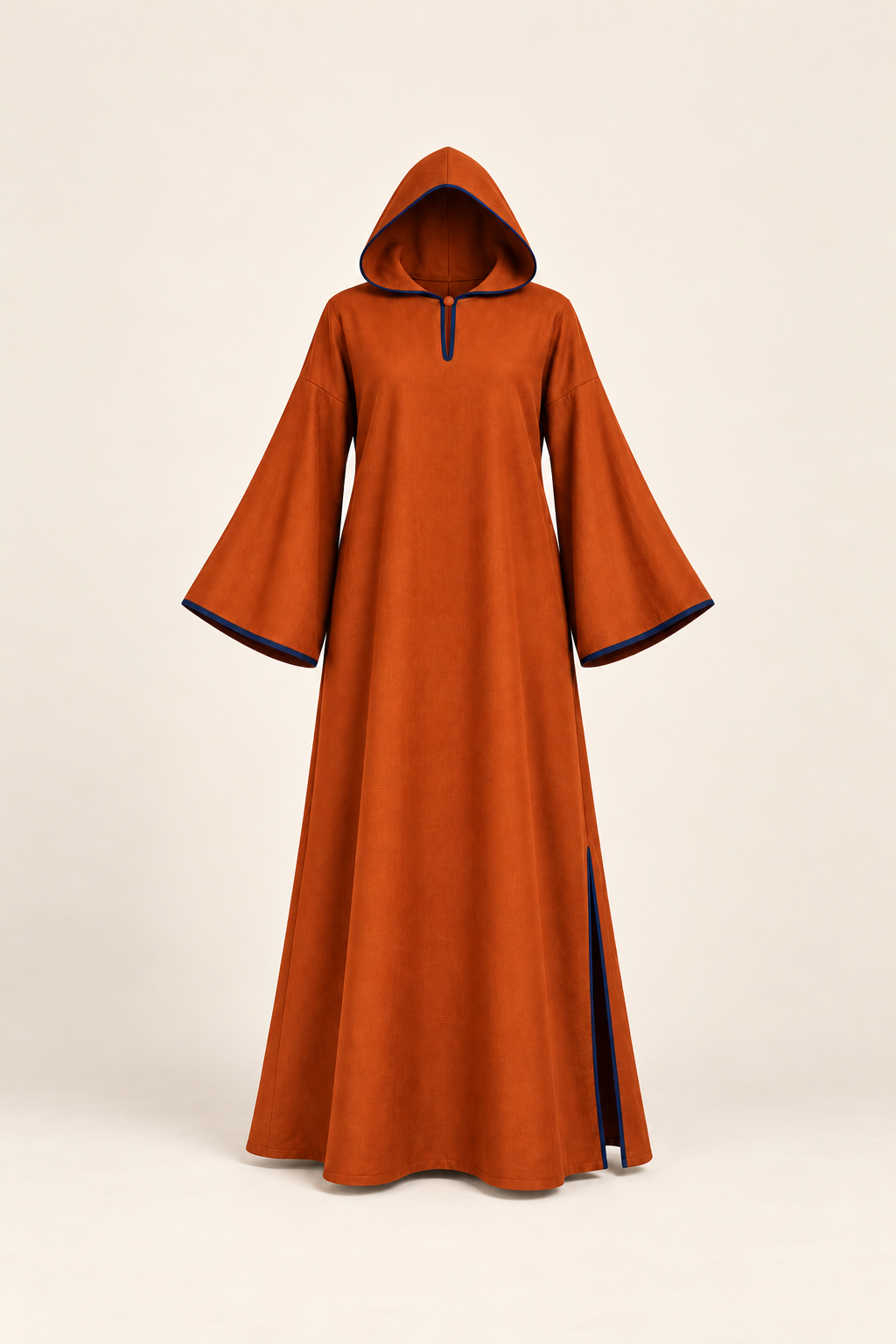 AI front preview of the same bell-sleeve caftan in burnt orange with navy edging and its attached hood raised
