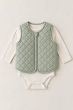 Front flat lay of a sage quilted baby vest design over a cream bodysuit