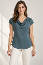 Generated design preview: front view of a slate-teal bias-cut cowl blouse with cap sleeves and a curved hip-length hem.