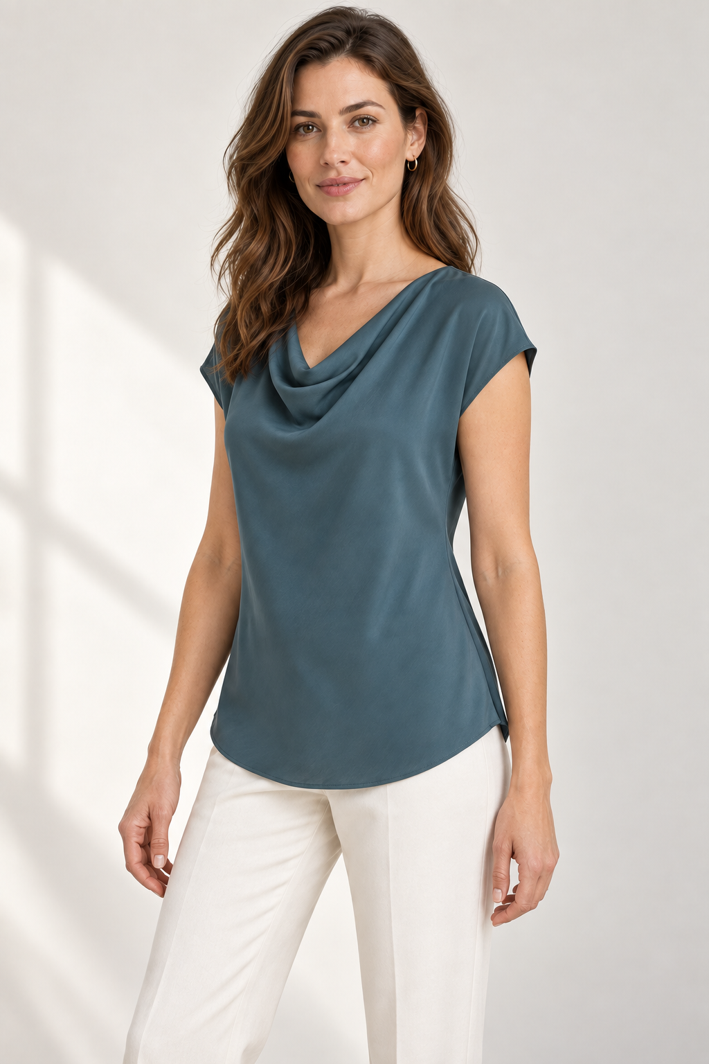 Generated design preview: three-quarter view of the bias-cut cowl blouse showing its fluid side drape and cap sleeve.