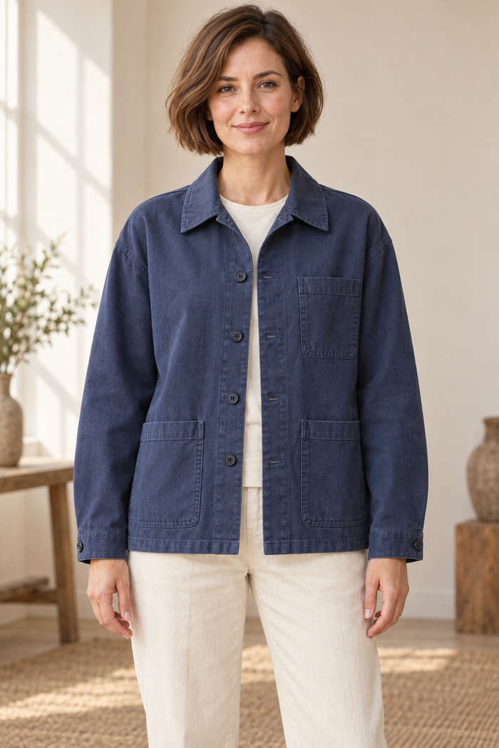 Design preview of a boxy cotton work jacket with dropped shoulders and front patch pockets, front view.