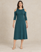 Front view of a teal cold-shoulder knit midi dress with a round neckline and three-quarter sleeves