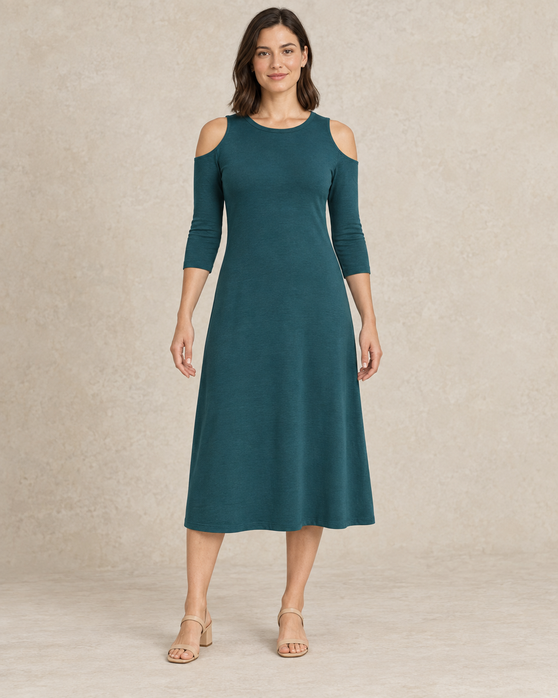 Front view of a teal cold-shoulder knit midi dress with a round neckline and three-quarter sleeves