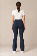 Back view of ink-navy high-waisted flared leggings with a plain broad waistband. Generated design preview.