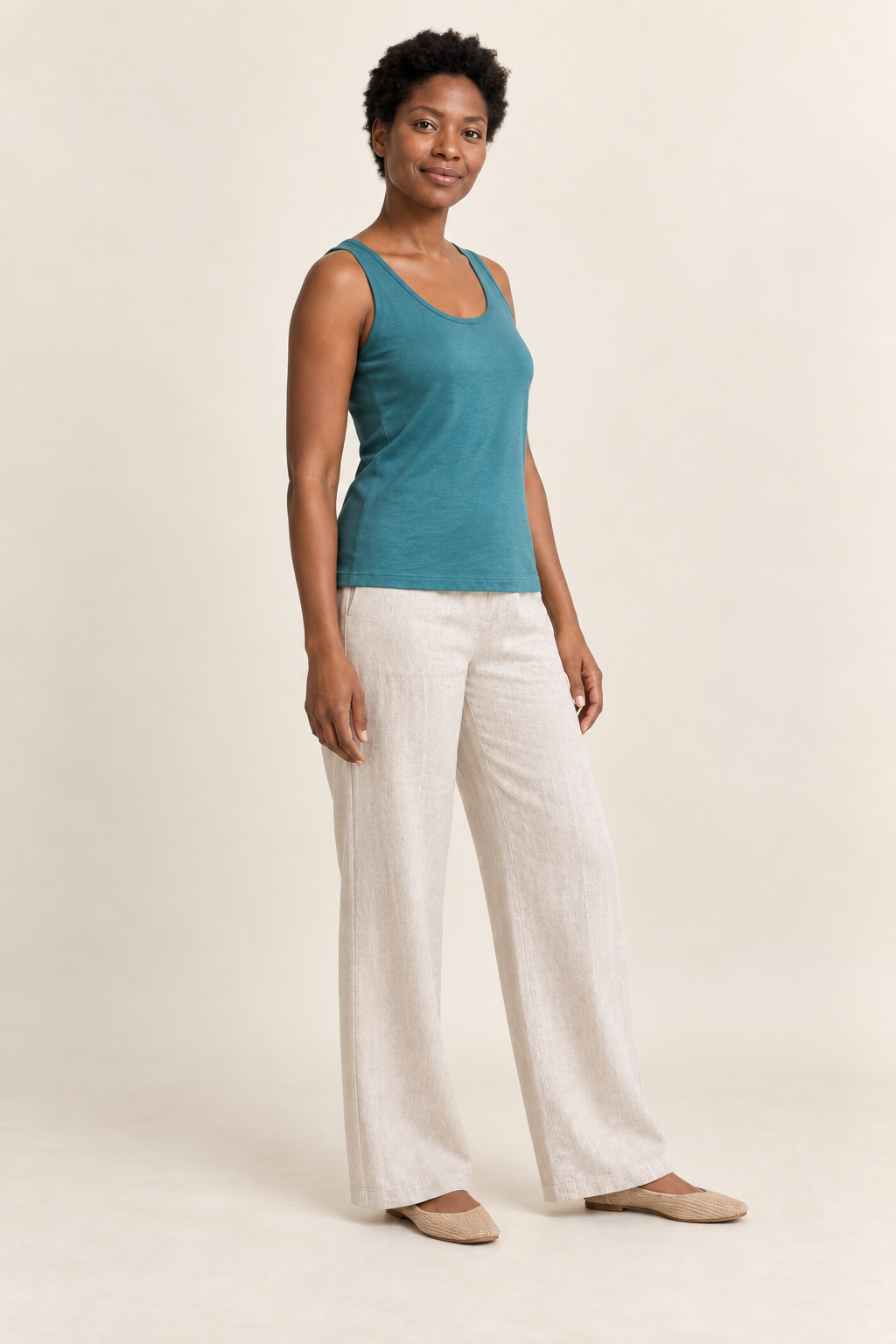 Three-quarter view of knit vest top design on a model
