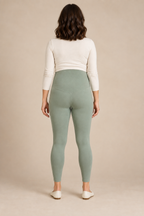 Back view of sage-green maternity leggings with a soft over-bump panel and ankle-length legs. Generated design preview.