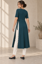 AI design preview: plain back of the teal knit layering tunic with a narrow waist tie and open-sided calf-length panels