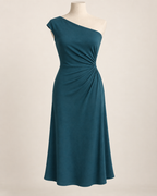 AI preview: petrol-teal knit midi dress with a diagonal off-shoulder neckline and gathers at the left waist.