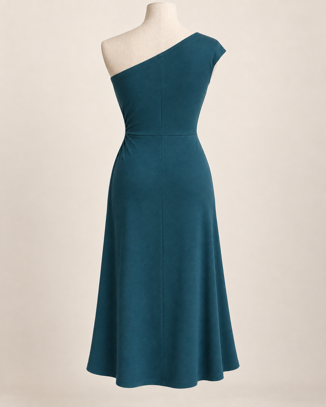 AI preview: rear of the petrol-teal asymmetric knit dress with a smooth back, waist join and flared midi hem.