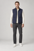 Front view of a men's navy diamond-quilted vest design with two patch pockets