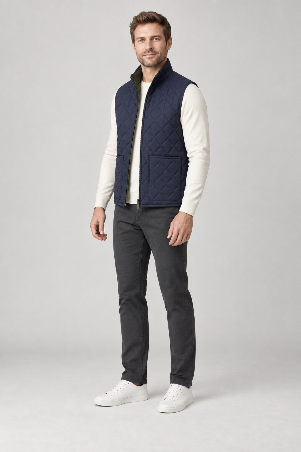 Three-quarter view of a men's navy diamond-quilted vest design