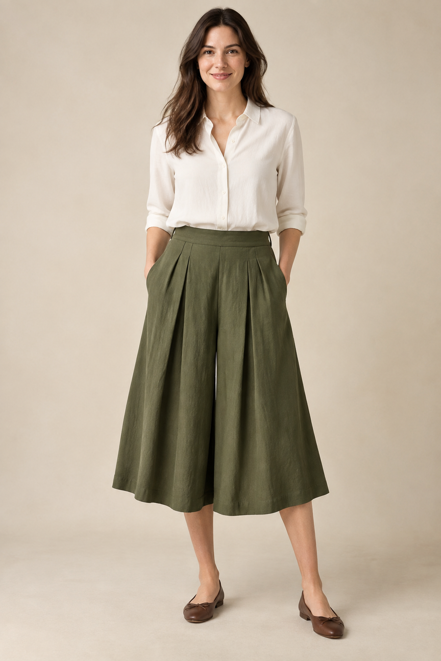 Design preview of pleated culottes and divided skirt, front view on an adult model.