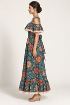 Side view of the SL001 floral maxi dress, showing its off-shoulder flounce and long gathered skirt. AI design concept.
