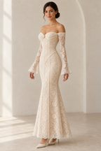 AI concept: front three-quarter view of the SL002 lace dress, showing bust drapes, pearl trim and a flared hem.