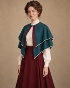 Three-quarter view showing the two layers and long pointed fronts of the SL003 bolero cape