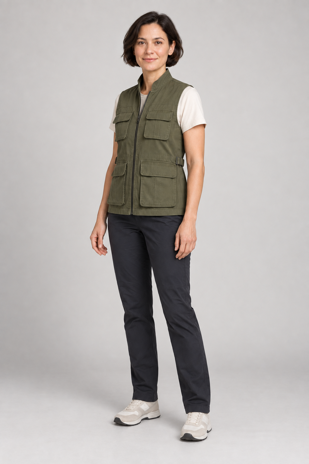 Three-quarter view of an olive four-pocket utility vest design on a woman