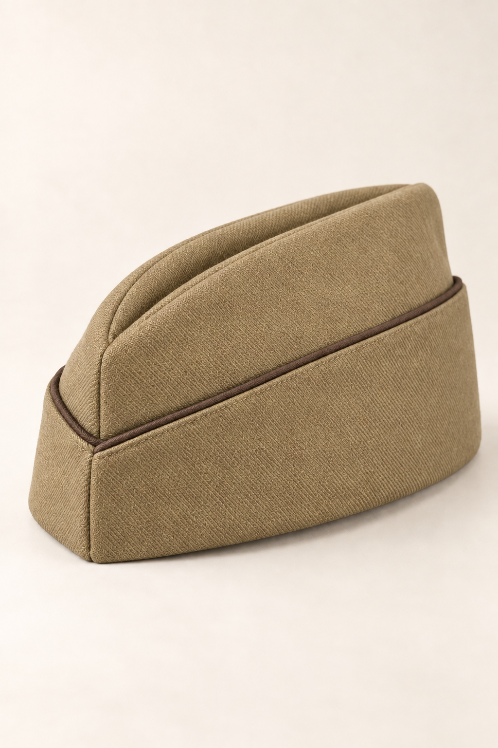 AI design preview: the same brimless garrison cap in khaki with dark-brown piping.