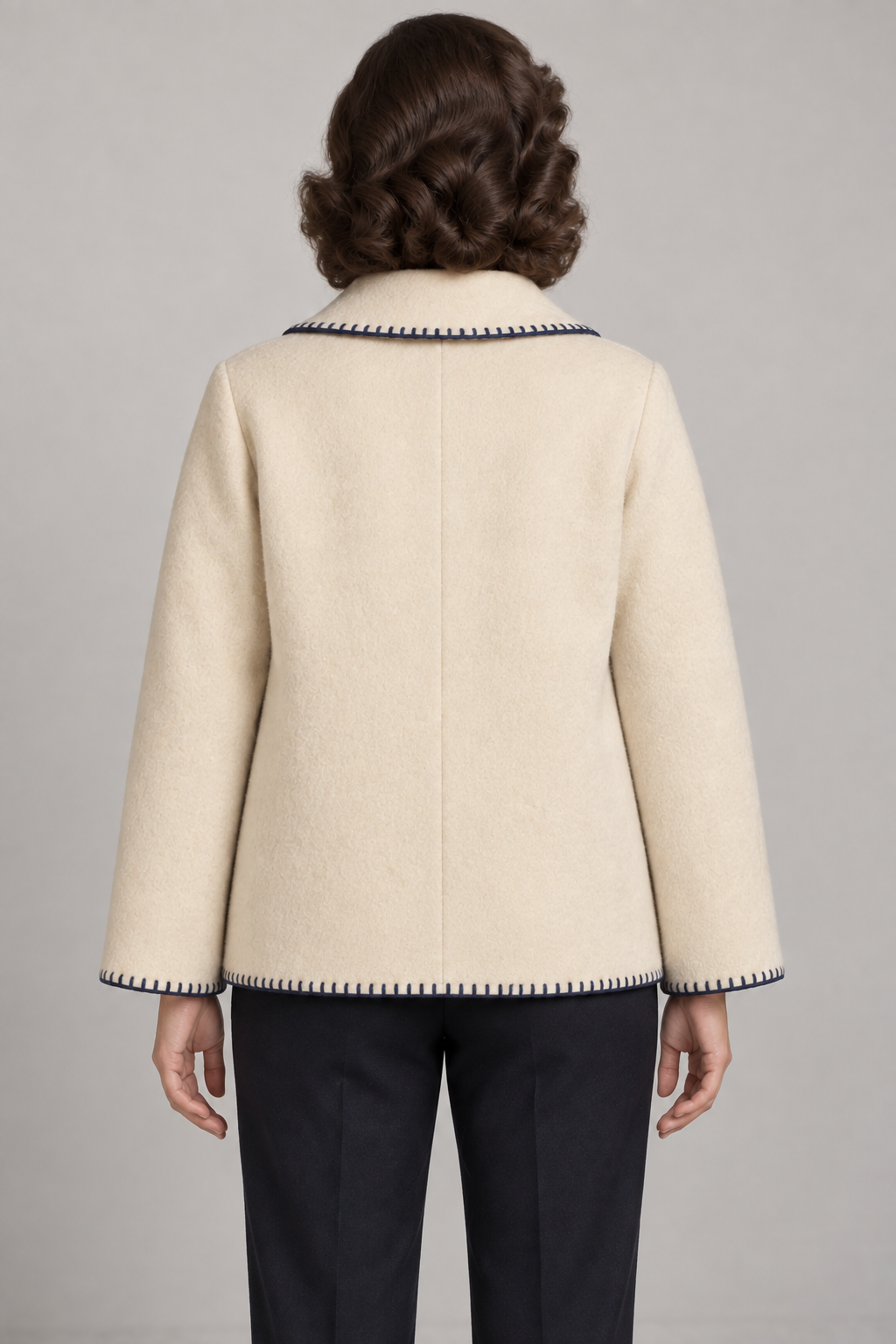AI design preview: plain cream felt jacket rear with center seam, wide sleeve hems and navy edge stitching.
