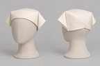 AI design preview: two angles of the same plain ivory folded cloth nurse cap.