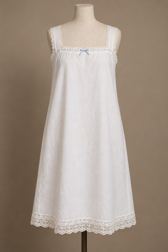 AI design preview: loose white square-neck chemise with broad straps, ivory lace and blue ribbon