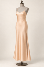 AI front preview of the pale-apricot long slip with a side vent visible in the skirt