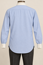 AI design preview: long powder-blue shirt back with gathered yoke and rounded shirttail