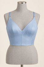 AI front preview of a powder-blue darted longline bra with a deep V neckline and shaped lower body