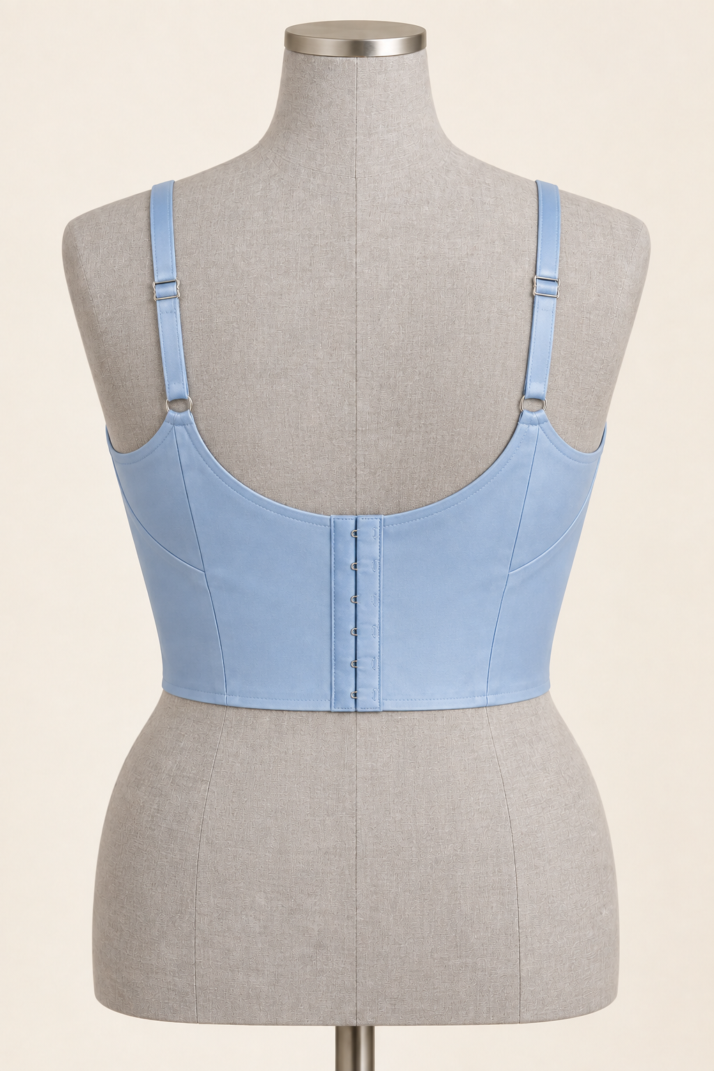 AI back preview of the powder-blue darted longline bra with adjustable straps and a long hook closure