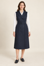 Front view of tailored vest dress design on a model