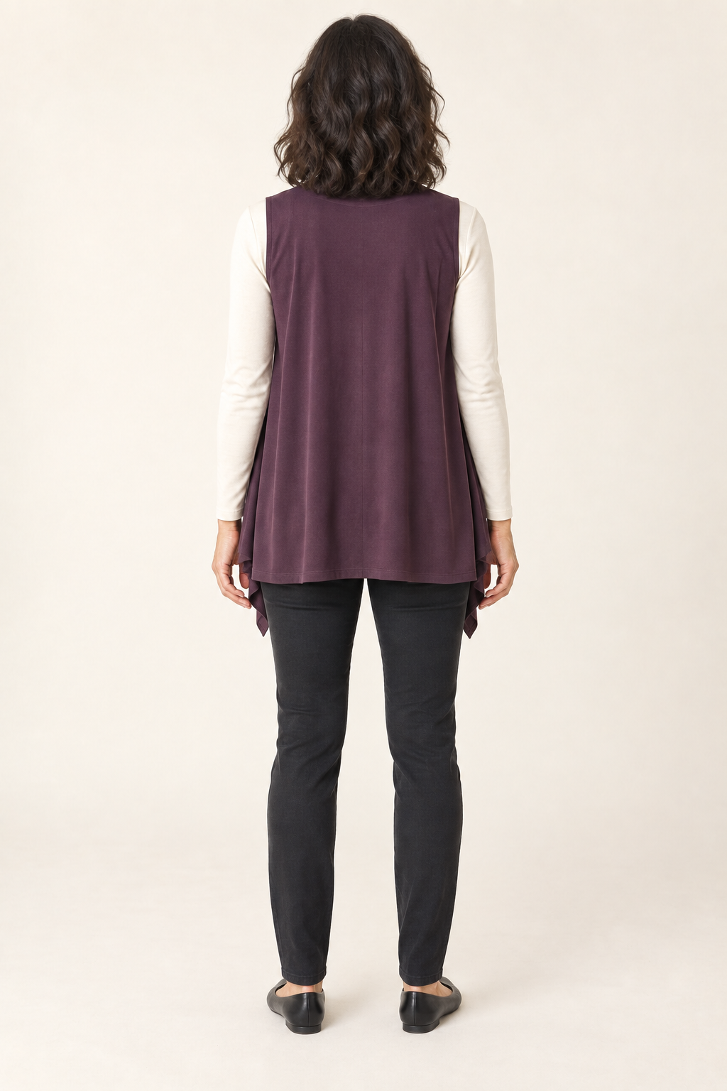 Back view of open-front waterfall vest design on a model