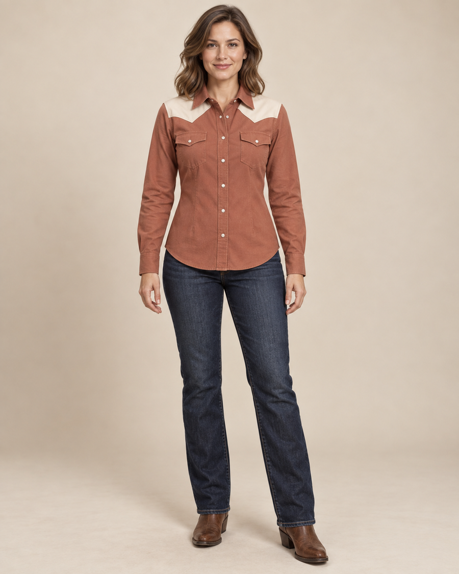 Design preview of women's Western-inspired shirt with shaped yokes and pointed pocket flaps, front view.
