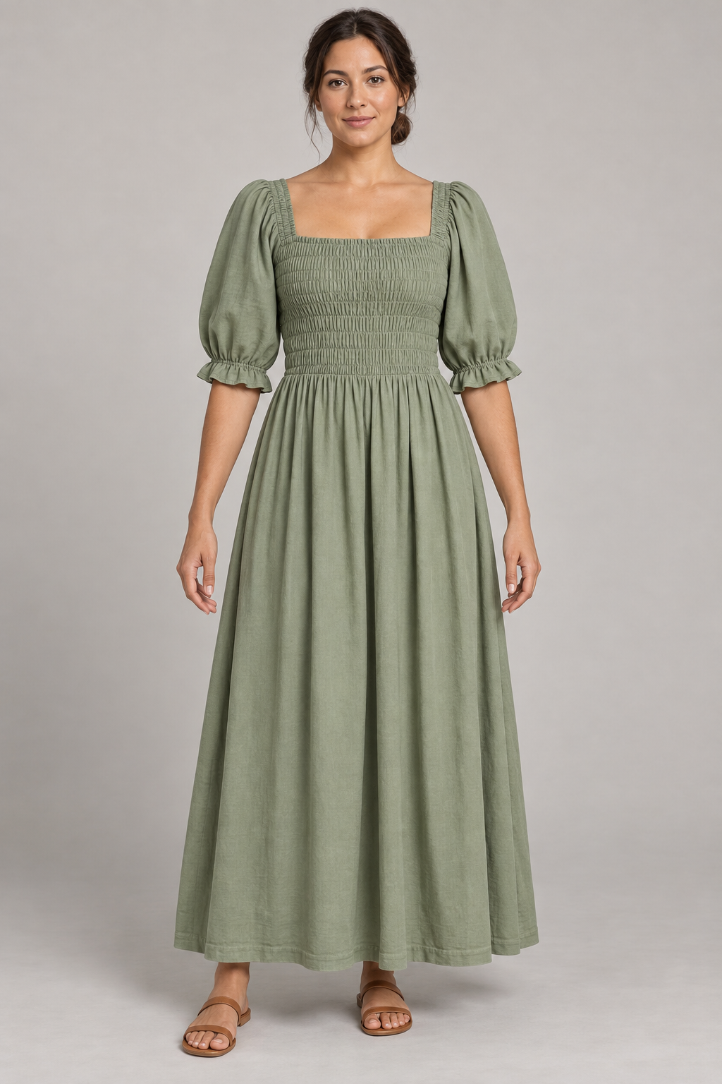 AI design preview: adult woman wearing a muted sage maxi dress with square neckline, fully shirred woven front bodice and elbow puff sleeves