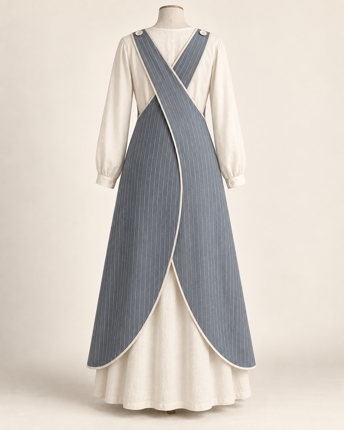 AI concept illustration of 1916 shoulder-button cross-back apron, back view in slate-blue pinstripe, on a mannequin.