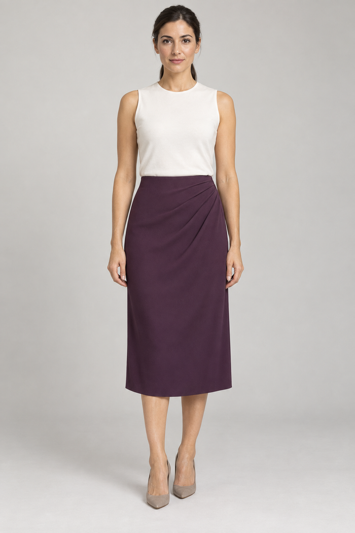 Front design preview of a plum woven midi skirt with fixed folds at the left hip and a clean faced waist.