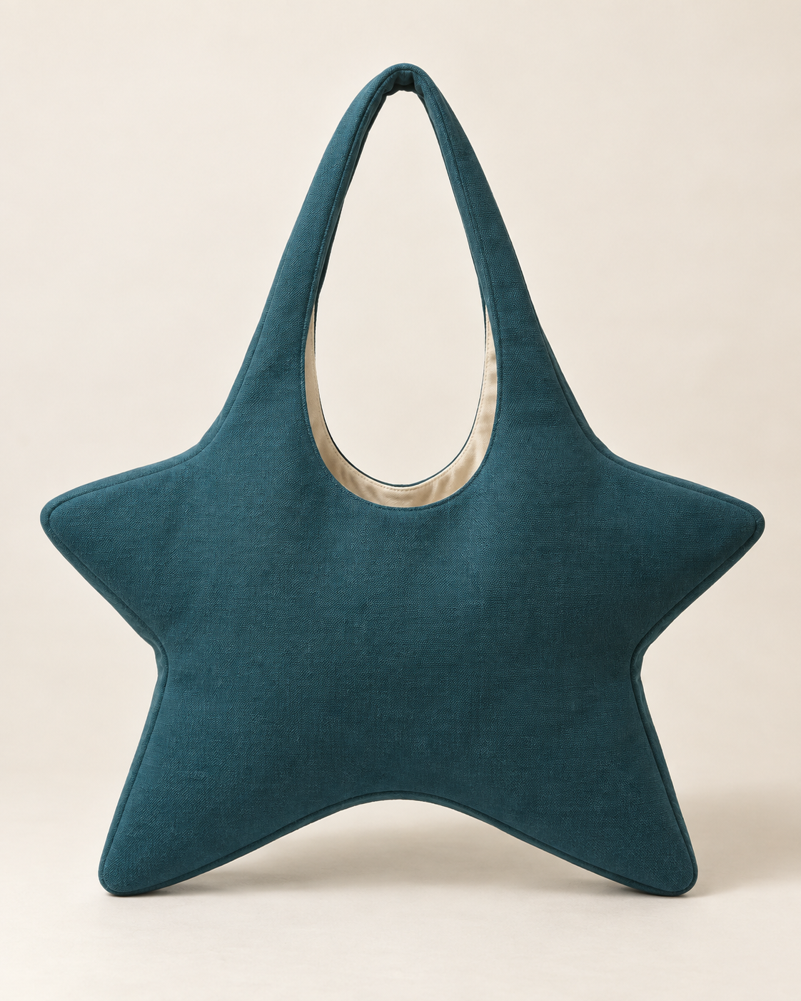 AI design preview: front of a teal star-shaped hobo bag with four pointed body lobes, deep U opening and single fixed fabric loop