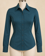 AI concept front view of fitted teal stretch Western show shirt with shaped yokes and snap opening.