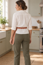 Design preview: rear view of the waist-only apron showing the wraparound tie band and open back without a rear apron panel.