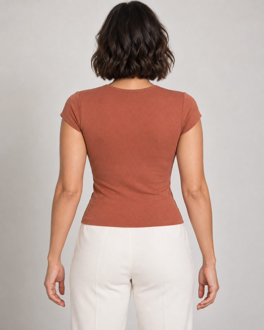 AI design preview: rear of the same terracotta top showing the planned plain closed back, round neckline and cap sleeves