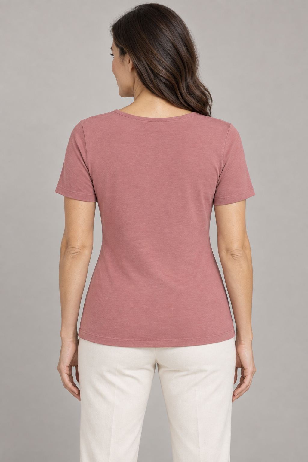 Back design preview of the dusty rose jersey top with short set-in sleeves and a plain hip-length back.