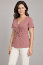 Three-quarter design preview of the dusty rose knit top, showing the front twist and hip-length side shape.