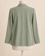 AI concept back view of sage waterfall jacket with center seam and straight hip-length hem.