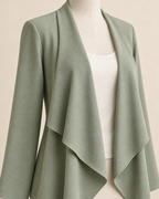AI concept detail of narrow finished waterfall jacket edge and set-in sleeve.