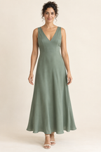 AI design preview: eucalyptus-jade woven V-neck dress with broad shoulders, waist seam and long bias skirt